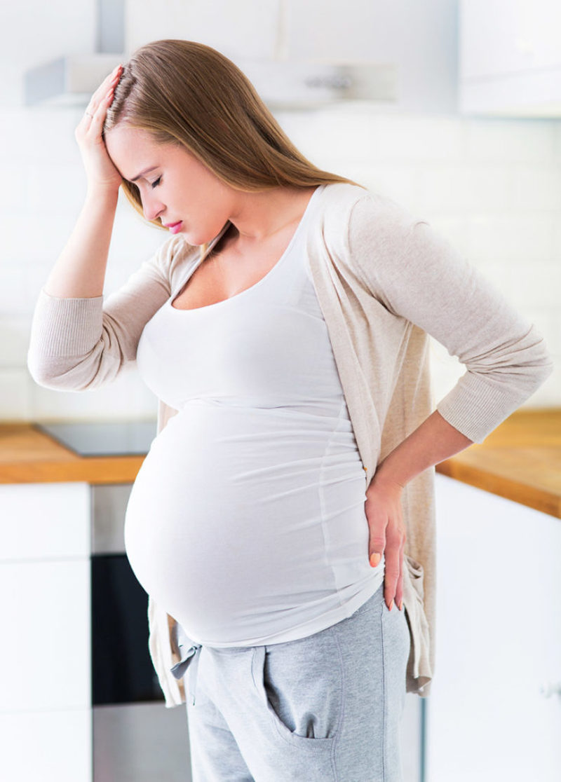 Болит живот у беременной